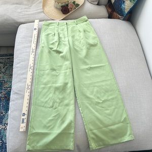Women’s wide-leg pants. Light lime-green.